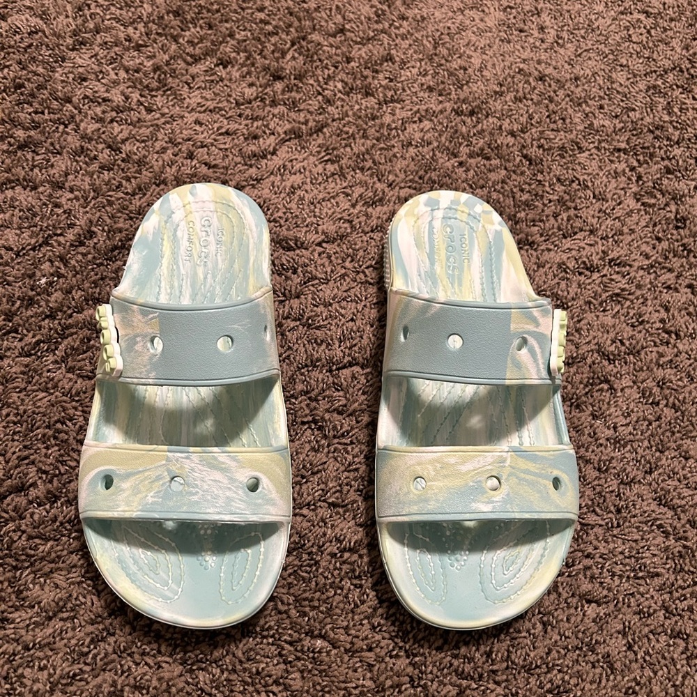 Tye dye crocs. Brand new never worn. Size 8 women’s and size 6 men’s.